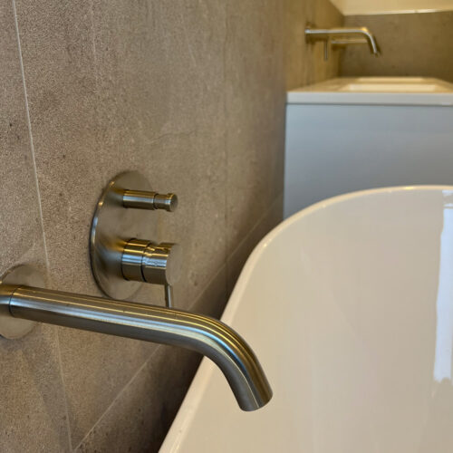 Knock Through Toilet ad Bathroom Company